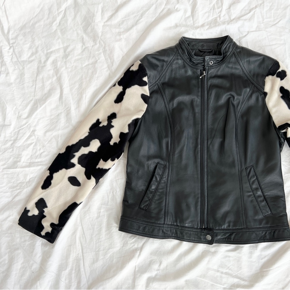 Genuine leather jacket with cow print sleeves